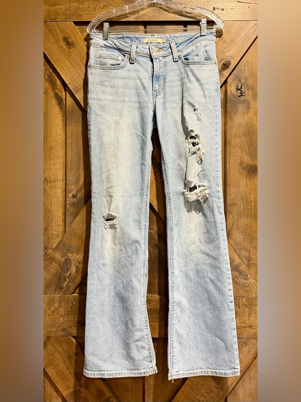 Levi’s Light Wash Super Low Distressed Flares Sz27
